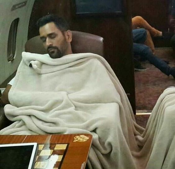 MS Dhoni sleeping while traveling in plane