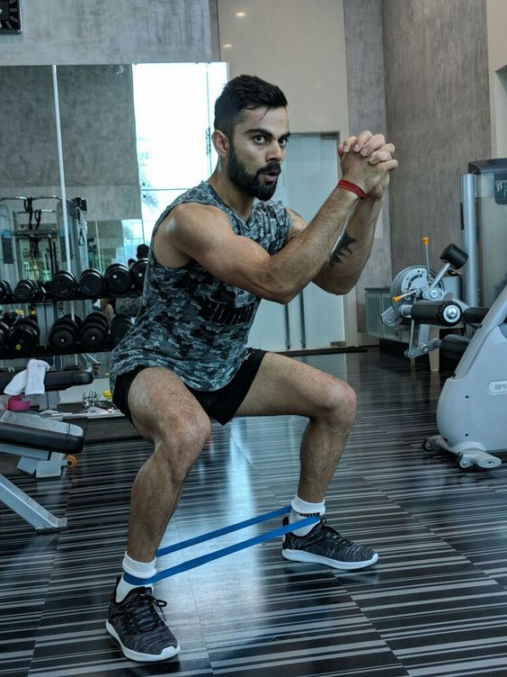 Virat Kohli doing squats in gym